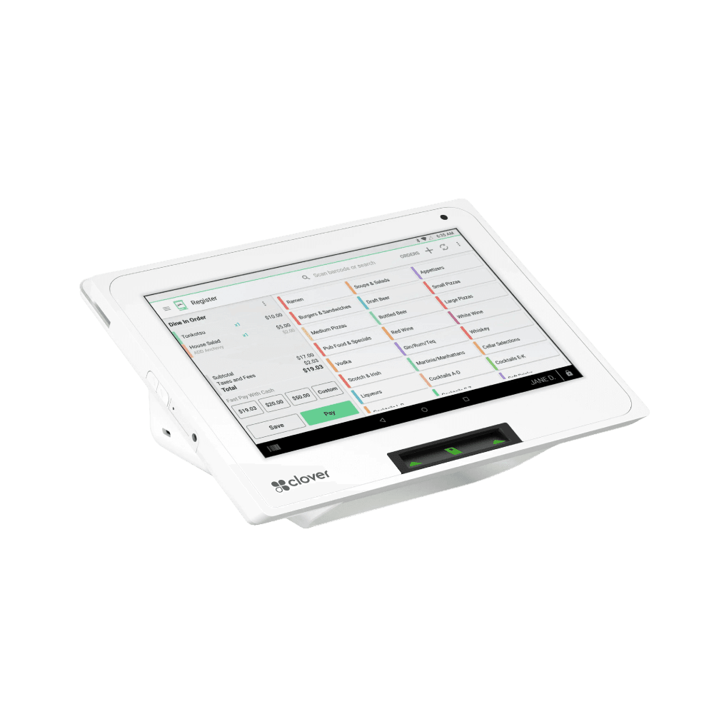 A Clover Mini terminal beside a tablet